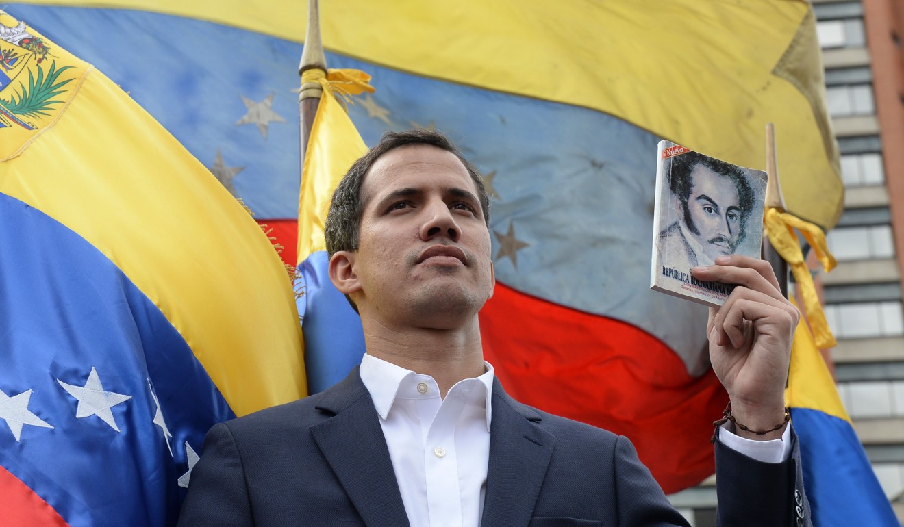Venezuela National Assembly head Juan Guaido declares himself the country's acting president in Caracas on Wednesday. Photo: AFP