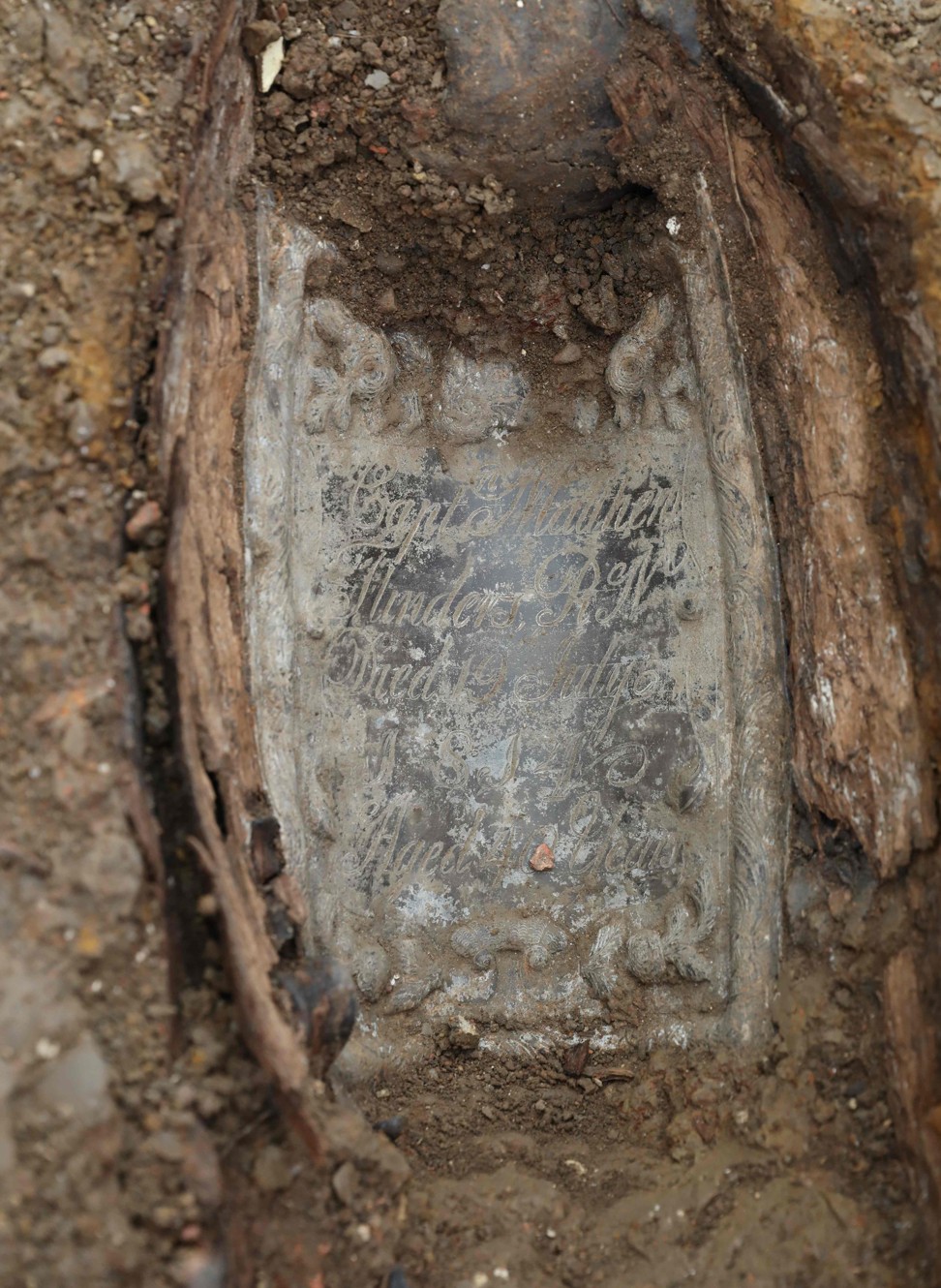 The coffin plate of Royal Navy captain Matthew Flinders, unearthed during the archaeological excavation and research works at St James's Gardens near Euston train station in London. Photo: AFP