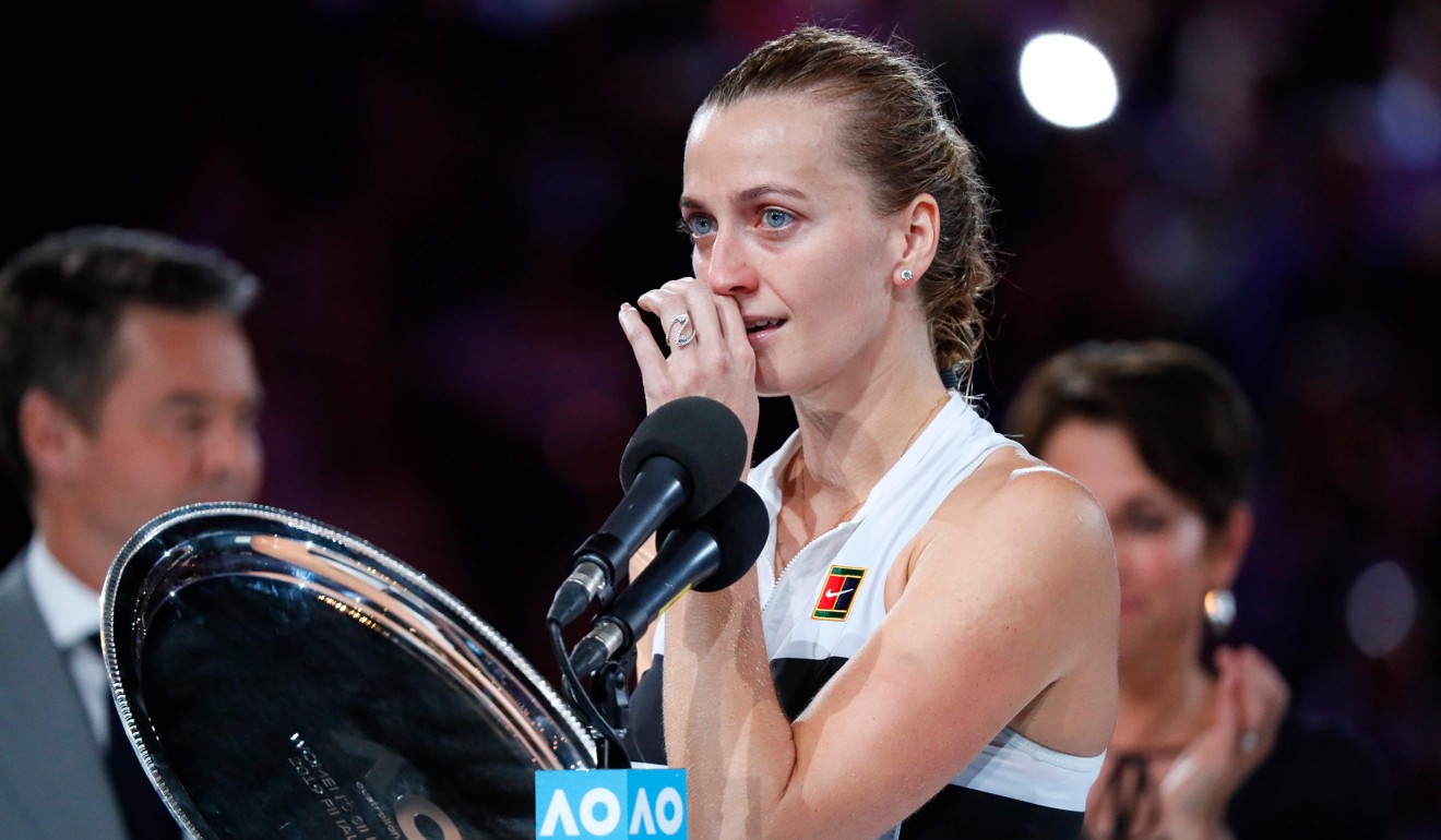 Petra Kvitova cries as she speaks during the Australian Open trophy presentation ceremony. Photo: AFP