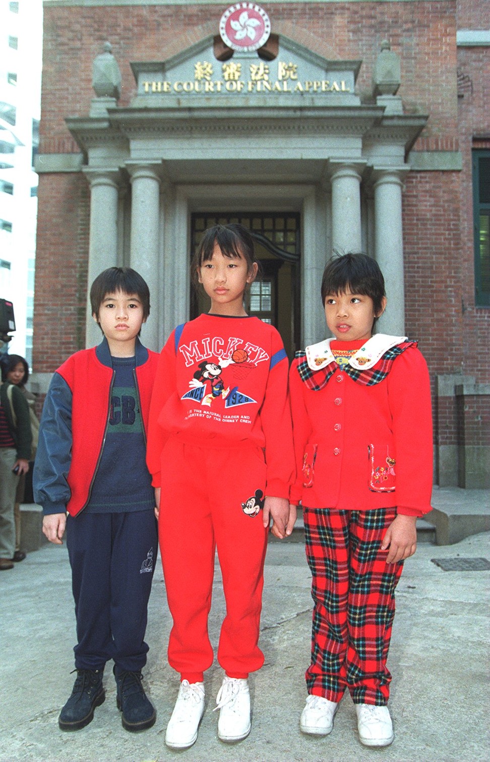 Abode seekers Cheung Lai-wah, Ng Ka-ling and Ng Tan-tan arrived at the Court of Final Appeal in January 1999. The court would make a short-lived ruling in their favour. Photo: Martin Chan