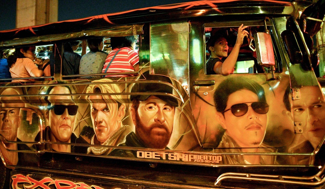 A jeepney’s moving canvas slows to a crawl in Manila’s rush hour. Photo: Agence France-Presse