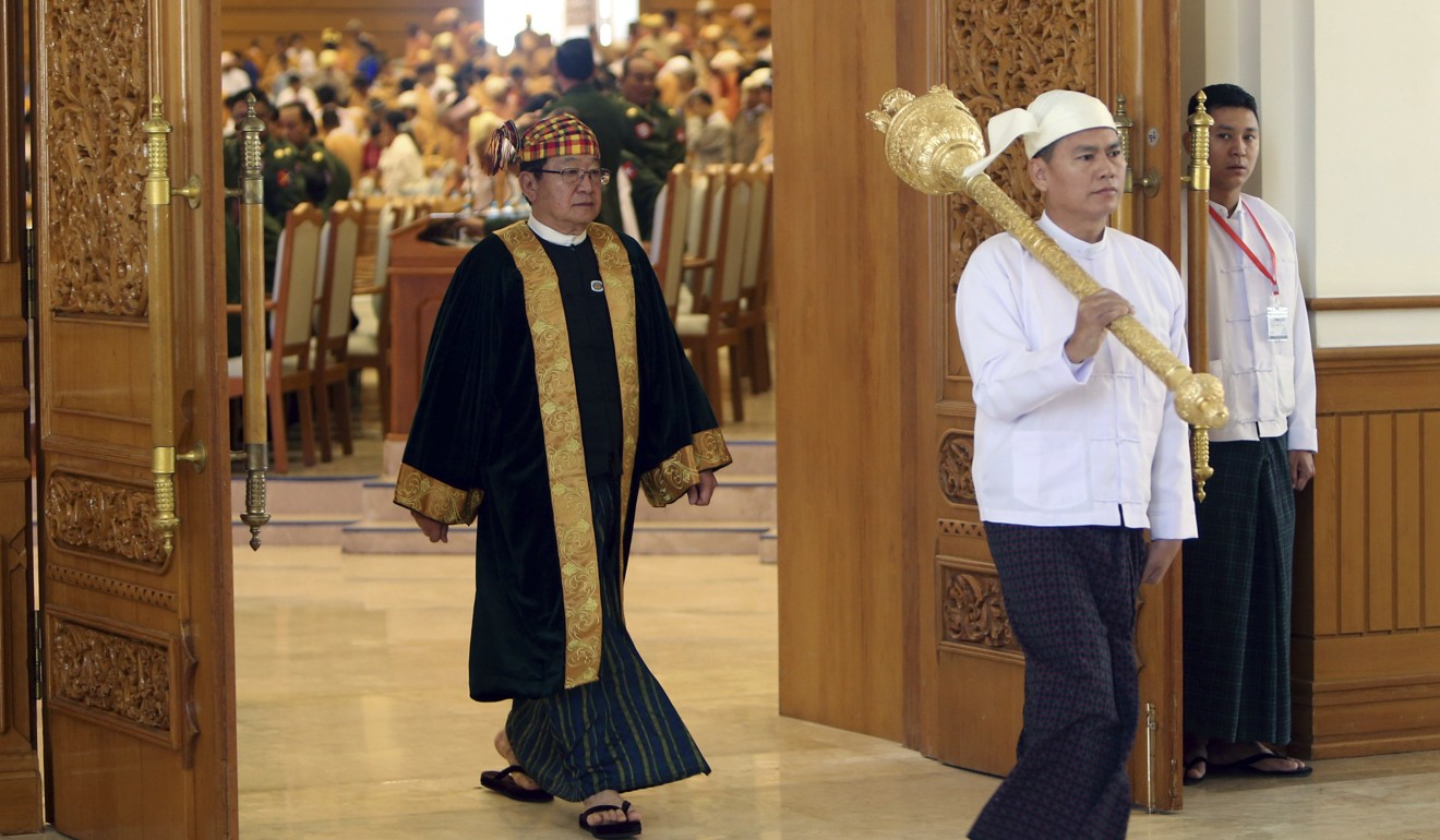 Parliament speaker T Khun Myat leaves after Tuesday’s parliamentary session. Photo: AP