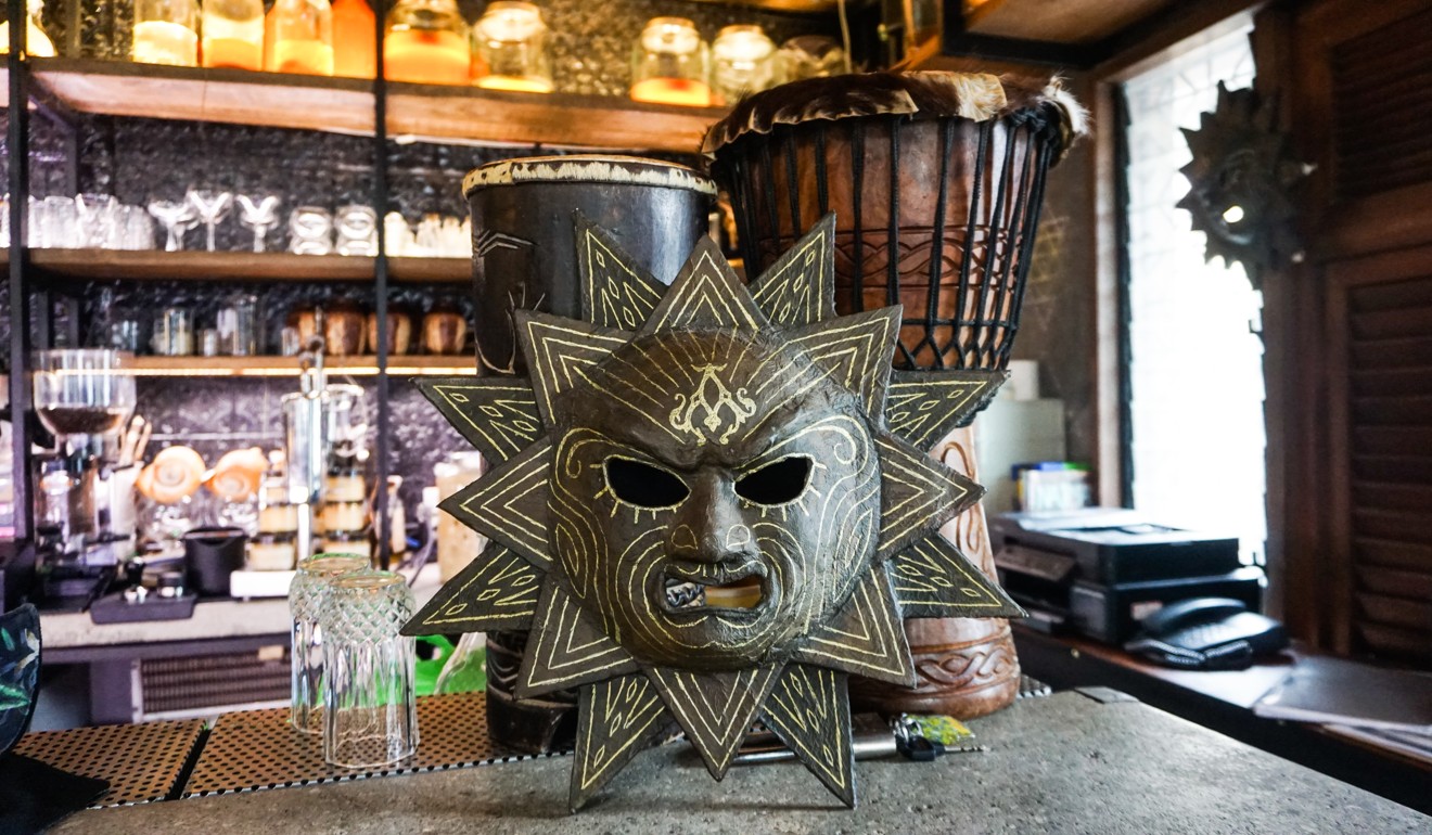 Waiters at Agimat Foraging Kitchen and Bar in the Philippine city of Makati put on this wooden carved mask and perform a ceremony inspired by Philippine tradition when serving drinks. Photo: AJ Bolando