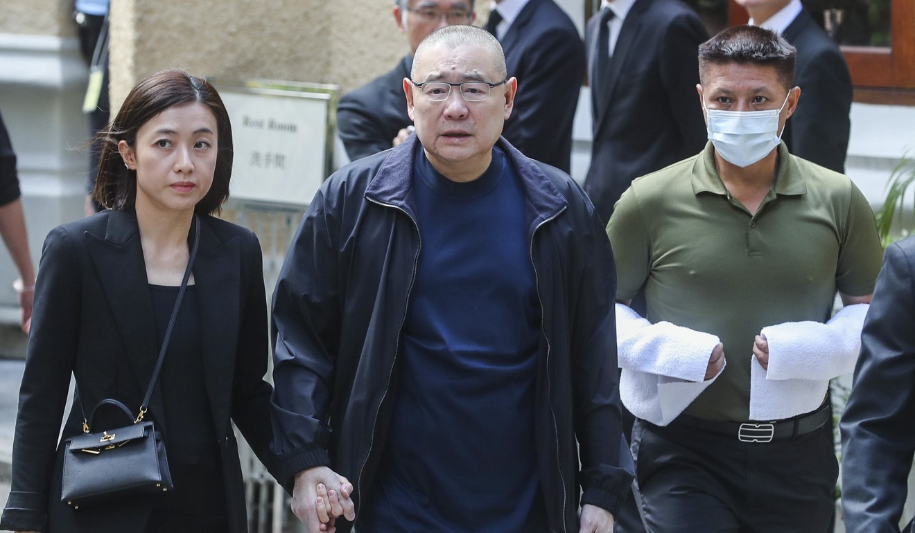 Joseph Lau (centre) was jailed in absentia by a Macau court in 2014. Photo: Sam Tsang