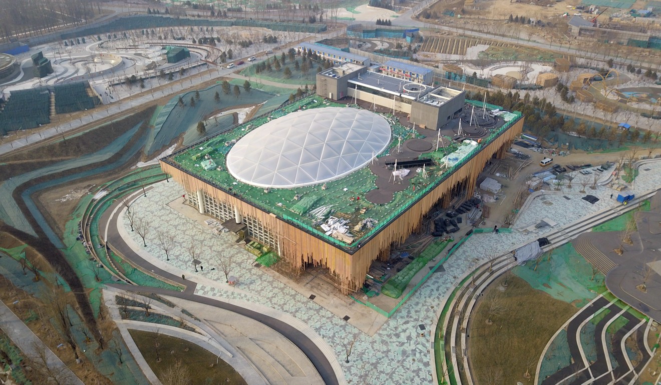 The Plant Pavilion is under construction as part of preparations for an international horticultural expo in Beijing this year that will feature some 100 indoor and outdoor gardens. China has stepped up its spending on infrastructure to boost its economy. Photo: Xinhua