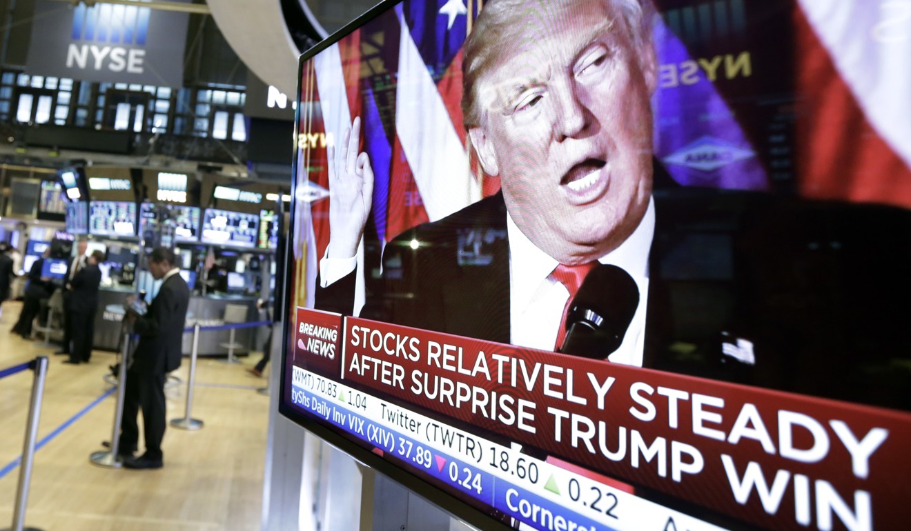 Trump appears on a television screen on the floor of the New York Stock Exchange on November 9, 2016. Photo: AP