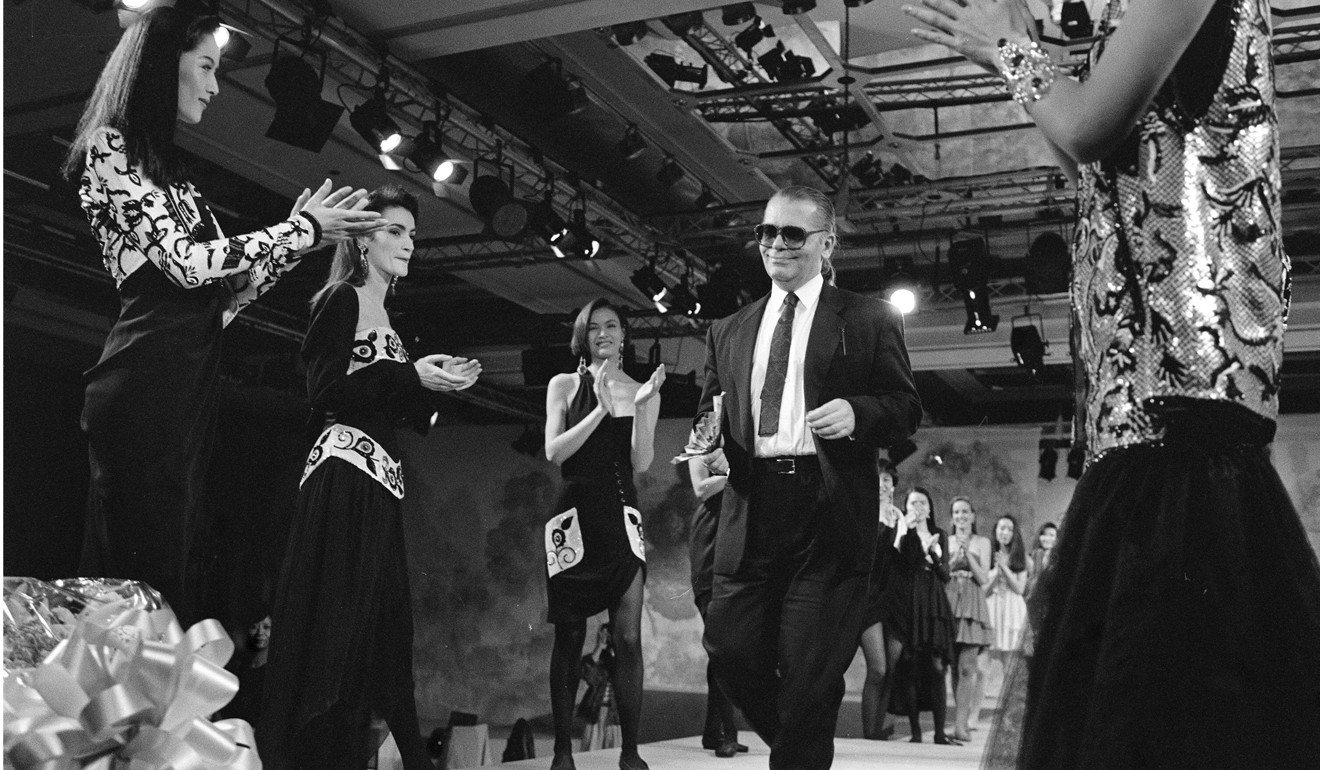 Model Qi Qi (far left), Janet Ma (third from left) and fellow models with Lagerfeld at his fashion show in Hong Kong in November 1989. Photo: SCMP