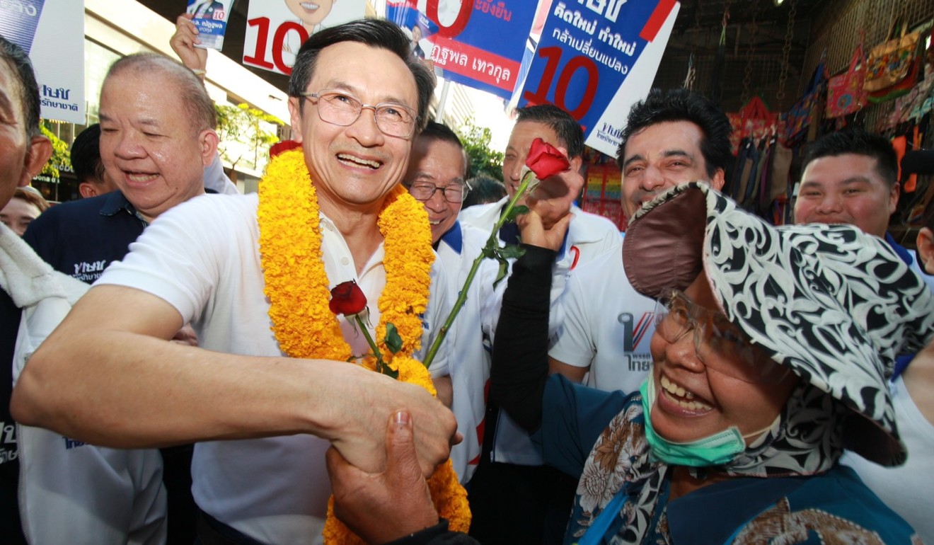 Chaturon Chaisang with a supporter in Bangkok on Wednesday. Photo: Handout