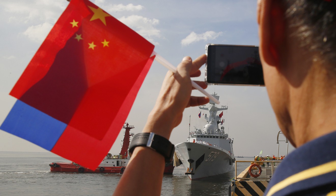 China’s Handan guided-missile frigate docks in Manila for a four-day port call in January. Photo: AP