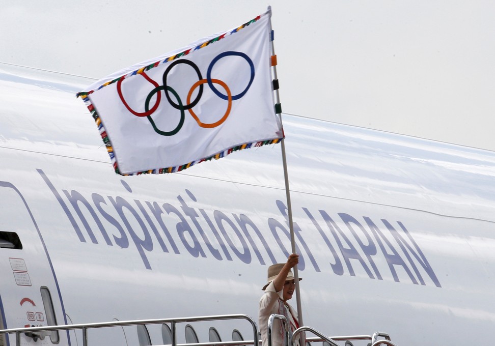 Tokyo governor Yuriko Koike at Haneda airport in Tokyo. Photo: Reuters