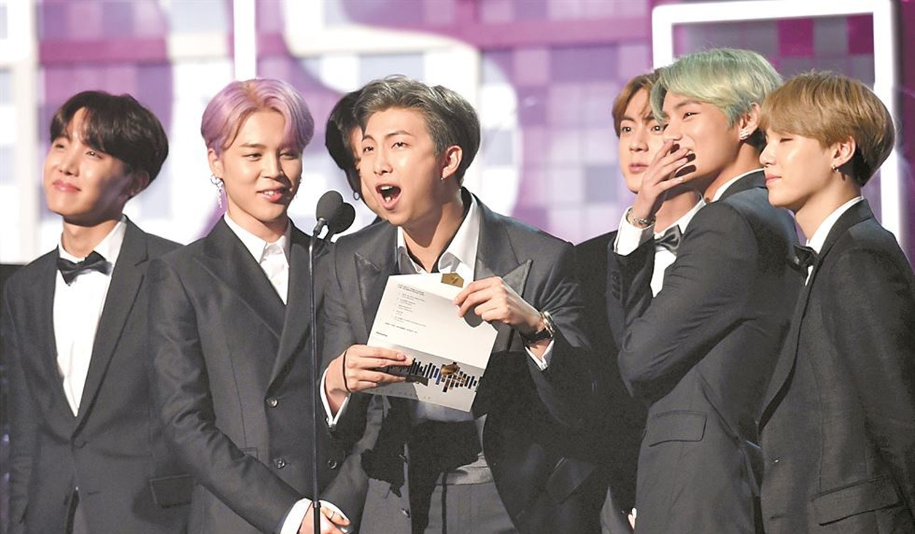 BTS present the award for Best R&B Album during the 61st Annual Grammy Awards in Los Angeles. Photo: AFP-Yonhap