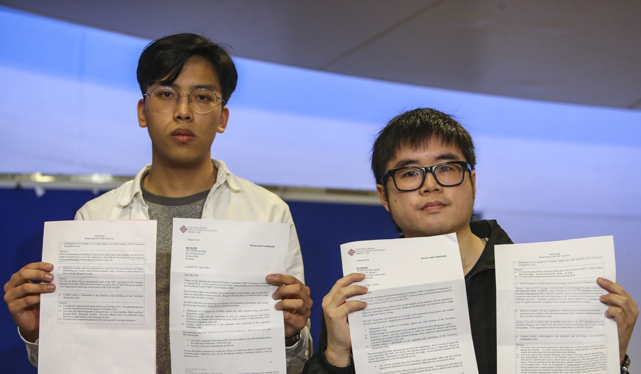 Lam (left) and Ho with letters from the university. Photo: Winson Wong