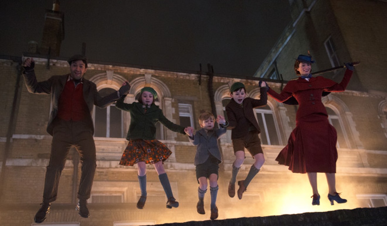 Emily Blunt (far right) as Mary Poppins with other cast members in a scene from Disney's musical, ‘Mary Poppins Returns’.