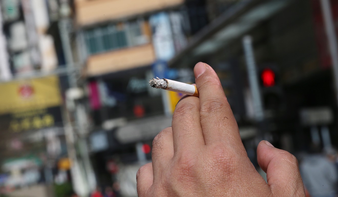 Why has the Hong Kong government banned e-cigarettes but done such a poor job of enforcing the ban on smoking in public areas? Photo: David Wong