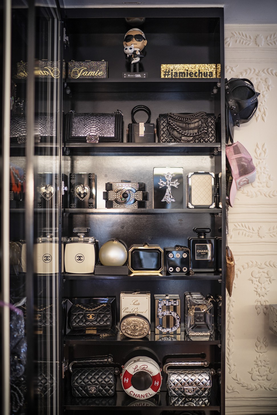 Chanel clutches and bags in Jamie Chua's wardrobe. Photo: Bryan van der Beek