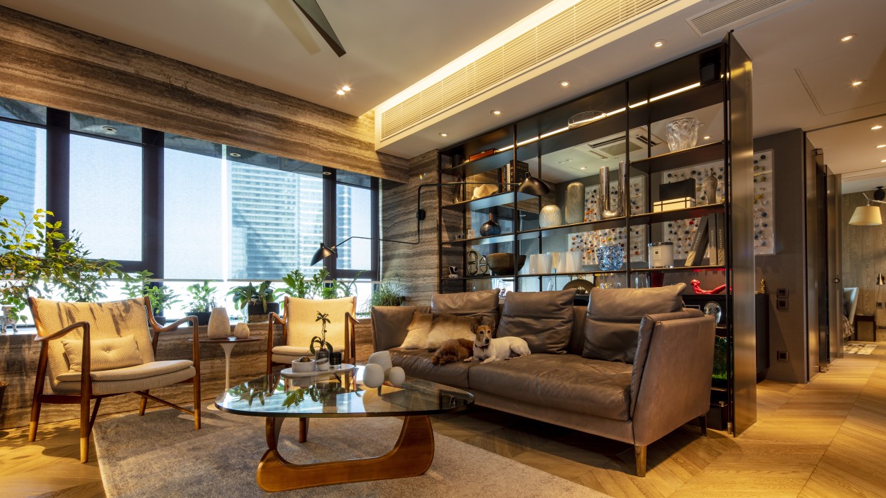 Inside an understated Hong Kong bachelor pad, where marble plays a central role in the interior design