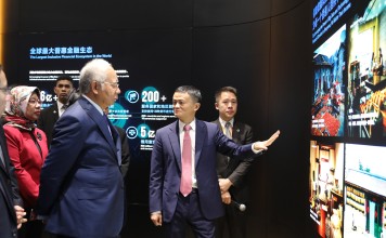 Alibaba Group executive chairman Jack Ma Yun takes Malaysian prime minister Najib Tun Razak and his delegation for a tour of Alibaba's headquarters in Hangzhou. Photo: Alibaba Group