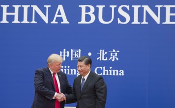 US President Donald Trump and China's President Xi Jinping at a business leaders event in Beijing. Photo: AFP