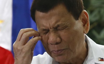 Philippine President Rodrigo Duterte speaks soon before boarding a flight for India to attend a regional summit. Photo: EPA Philippine President Rodrigo Duterte speaks soon before boarding a flight for India to attend a regional summit. Photo: EPA