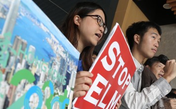 Protesters shout slogans against the planned East Lantau Metropolis (ELM), outside a public forum held by the government on “Hong Kong 2030+: Towards a Planning Vision and Strategy Transcending 2030”, at the Chinese University of Hong Kong in Sha Tin in December 2016. Photo: Paul Yeung