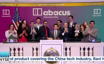 Abacus executive producer Ravi Hiranand (sixth from left) and Malcolm Ong, group director for product at SCMP Publishers (seventh from left), ring Friday’s opening bell at the New York Stock Exchange, marking the launch of Abacus – a news site focused on China’s technology industry. Photo: Abacus