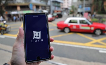 Uber has faced an uphill battle in Hong Kong, where local taxi firms see the ride-sharing app as anathema to their livelihoods. Photo: Winson Wong