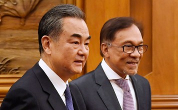 Çhina’s Foreign Minister Wang Yi meets with Malaysia’s prime-minister-in-waiting Anwar Ibrahim at the Diaoyutai State Guesthouse in Beijing. Photo: AFP