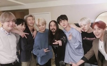 American musician, DJ and music producer Steve Aoki (centre, with a beard and moustache) and the seven members of K-pop boy band BTS, who have teamed up on the new single, ‘Waste It On Me’. Photo: Steve Aoki’s Twitter