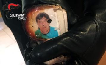 A charred passport photo purported to be that of alleged Camorra crime boss Antonio Orlando. The reputed gang boss was in the process of destroying identity documents when police arrested him. Photo: Carabinieri Napoli