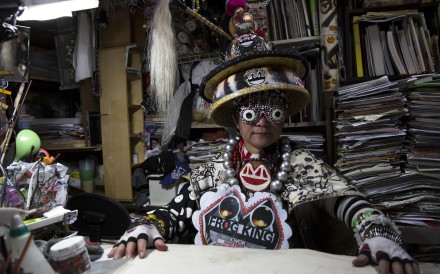 Artist Kwok Mang-ho is all dressed up for the part. Photo: Robin Fall