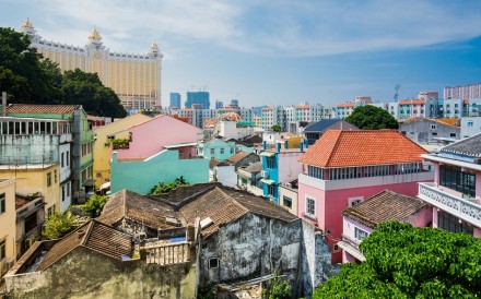 Galaxy Macau resort towers over Taipa Village in a juxtaposition of modernity and tradition. Galaxy Macau resort towers over Taipa Village in a juxtaposition of modernity and tradition.
