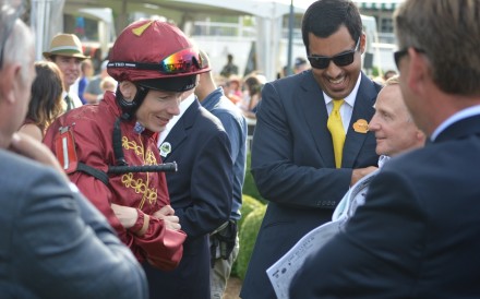 Jamie Spencer and Sheikh Fahad al-Thani share a joke at the Arlington Million in Chicago in August. The same weekend, the Qatari royal told Spencer his services as a jockey would no longer be required. Photo: SCMP Pictures