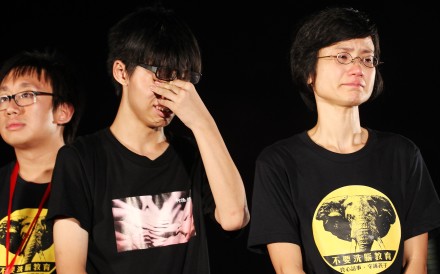 Joshua Wong (centre) protests against national education at a rally outside government headquarters, in Admiralty, in 2012. Picture: Felix Wong