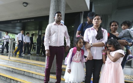 (left to right): Ajith Pushpa Kumara; Keana and her mother Vanessa Mae Rodel; Supun Thilina Kellapatha (back row); Sethmundi Kellapatha with mother Nadeeka Dilrukshi Nonis and brother Dinath – the asylum seekers who sheltered Edward Snowden when he was hiding in Hong Kong. Photo: David Wong