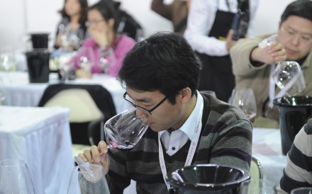 Chinese people take a wine tasting course at the VINISUD, the world's leading Mediterranean wines fair being held in Shanghai on February 27, 2013. China is catching up fast and is expected to become the world's sixth largest wine consumer by 2014. Photo: AFP