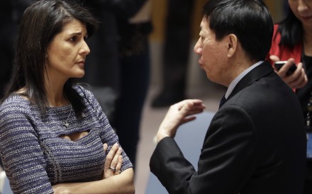 Awkward conversation: US ambassador to the UN Nikki Haley and Chinese deputy ambassador Wu Haitao. Photo: AP