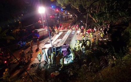 The double-decker came to a stop tipped on its side on Tai Po Road. Photo: Felix Wong