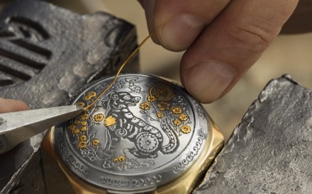 Panerai’s Luminor Sealand Year of the Dog watch, which features gold threads inlaid onto the engraved steel lid. 