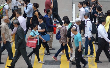 Office workers in Central, the financial district of Hong Kong. Photo: Fung Chang