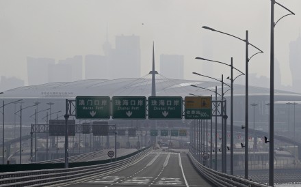 Hong Kong leader moves to allay fears over bridge safety days after protective blocks appear to drift away from artificial island, leaving sea tunnel threatened 