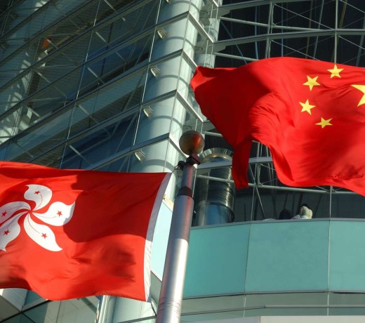 Flags of the People's Republic of China and Hong Kong Special Administrative region. Photo: Shutterstock Flags of the People's Republic of China and Hong Kong Special Administrative region. Photo: Shutterstock