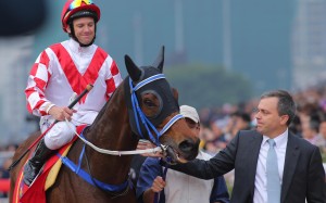 Caspar Fownes and Brett Prebble show their admiration for Lucky Nine after his tenacious victory in the Chairman's Sprint Prize. Photo: Kenneth Chan