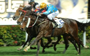 Nash Rawiller punches out Supreme Falcon with his "fried rice" style to win at Happy Valley last week. 