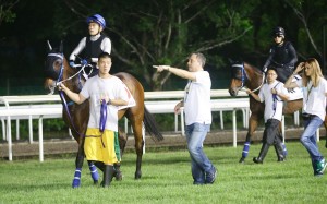 Caspar Fownes briefs his riders at gallops in Singapore. He has been happy with his horses preparation. Photo: Kenneth Chan