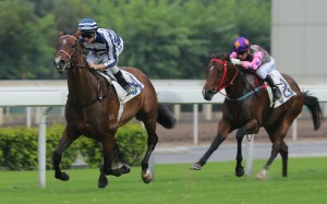 Packing Pins (Zac Purton) races away from Amazing Kids (Joao Moreira) to score a resounding success and set himself up for a Hong Kong Mile tilt. Photo: Kenneth Chan