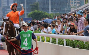 Neil Callan celebrates aboard Blazing Speed after winning the Standard Chartered Champions & Chater Cup in May. Photos: Kenneth Chan