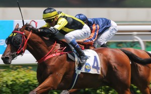 Douglas Whyte pushes Dukedom over the line at Sha Tin on Sunday. Photos: Kenneth Chan