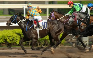 Karis Teetan celebrates Mega Red’s win in June. Photos: Kenneth Chan