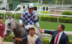 Chad Schofield greets winning trainer Michael Freedman after Silverfield scored at Sha Tin on September 24. Photos: Kenneth Chan.