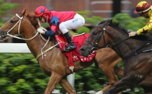 Matthew Chadwick guides The Golden Age to victory at Happy Valley on Sunday. Photos: Kenneth Chan